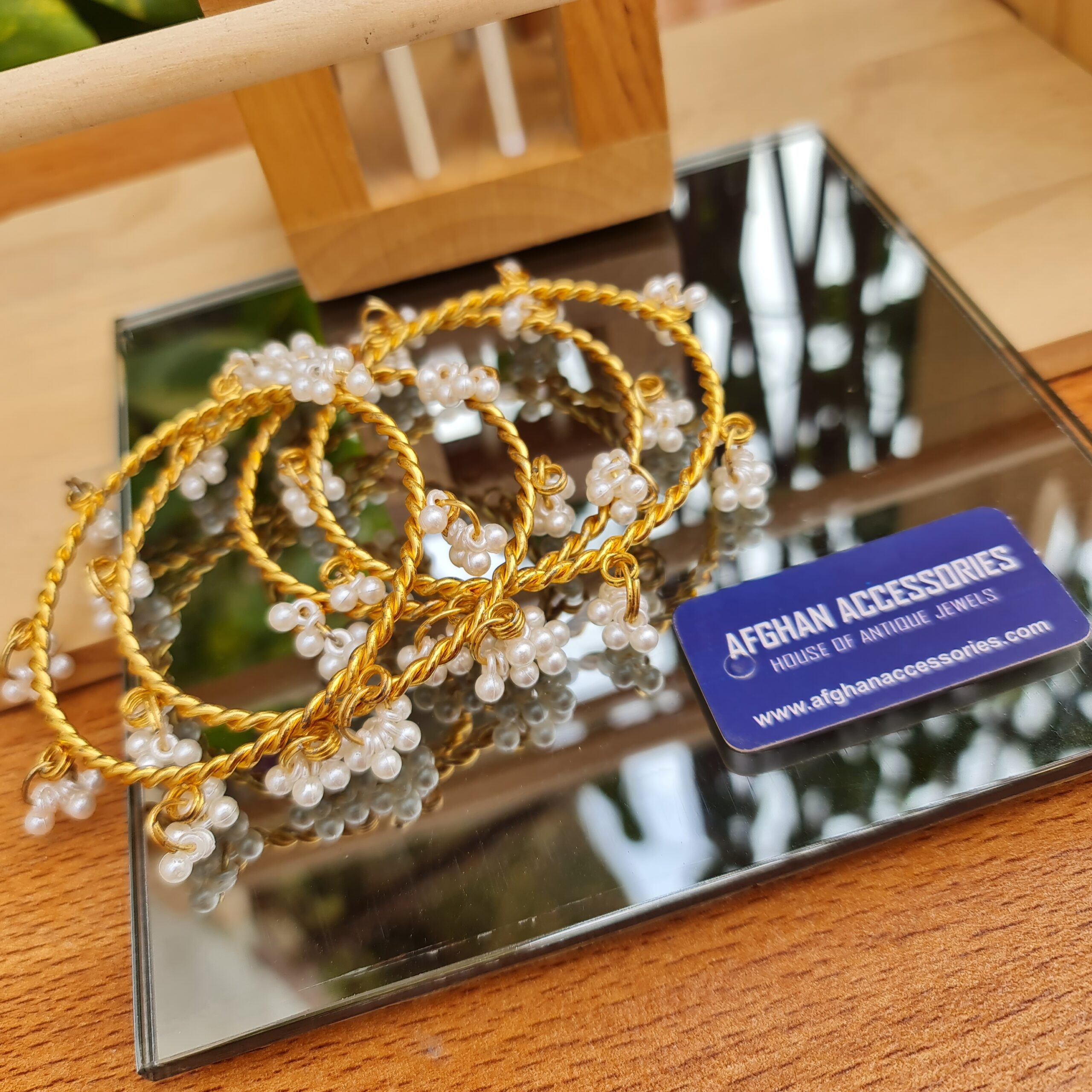 20260806_180702 Pearl Bangles Set with Elegant Traditional Pearl Detailing