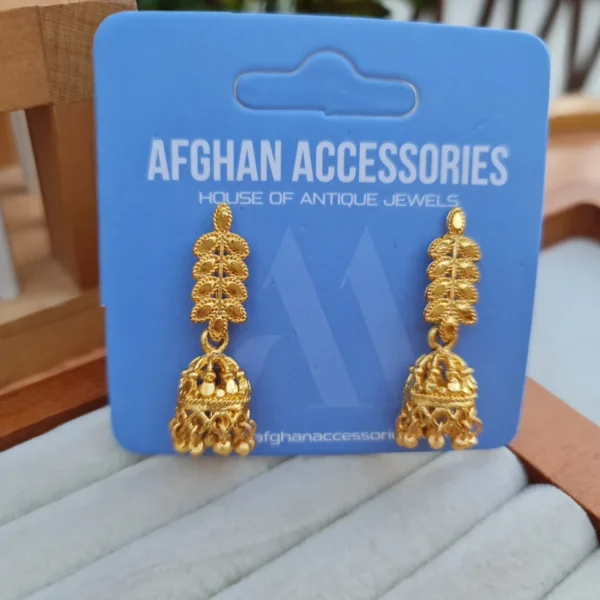 Antique golden jhumki earrings with mini bell-shaped domes and tiny gold beads